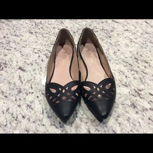 Black leather flats